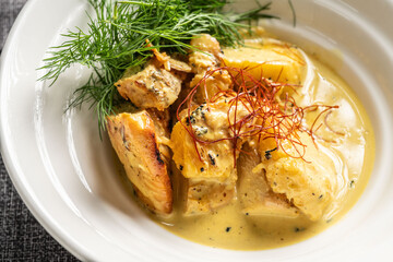 Chicken fillet in creamy mustard sauce with herbs
