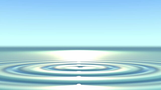 Drop Creating Expanding Ripples on a Calm Water Surface
