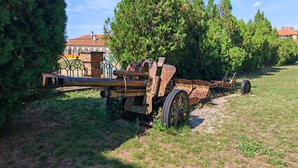 Old rusty artillery cannon outdoors