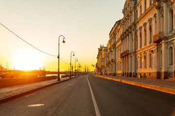 Sunrise over the empty streets of Saint Petersburg, Russia by the river