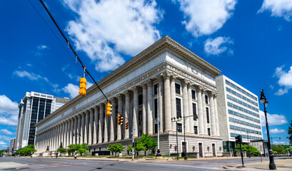The historic New York State Education Building, featuring a grand colonnade of Corinthian columns, on a sunny day in downtown Albany, United States