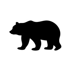 Silhouette of a large bear with thick fur walking leftward direction