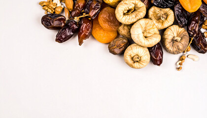 Obraz premium Mixed Dried Fruits Flatlay with Empty Copy Space. Bishvat jewish festival. Generated Image