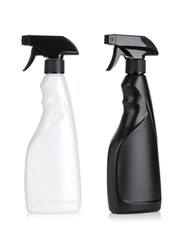 Two spray bottles, white and black