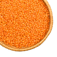 Red lentils filling a woven basket on transparent background