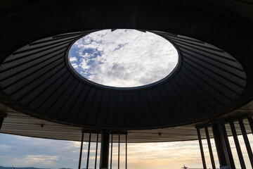 Fototapeta premium cloudy sky viewed through the ceiling hole of the observatory