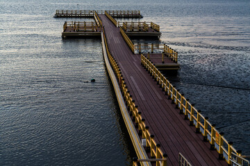 high angle view of the pier on the muddy beach