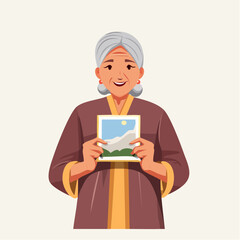Joyful elderly woman proudly displays a cherished landscape photograph, sharing a warm memory.