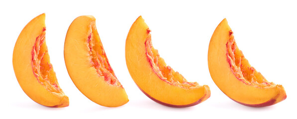Peach and slice in closeup isolated on white background