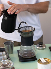 barista quick filter coffee brewing close up