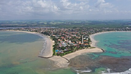 Fantastic panoramic view of Serrambi beach with coral reefs, natural swimming pools in the sea,...