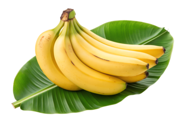 Bunch of ripe yellow bananas on a green leaf isolated on white background