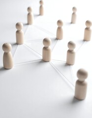 Wooden figures connected by threads