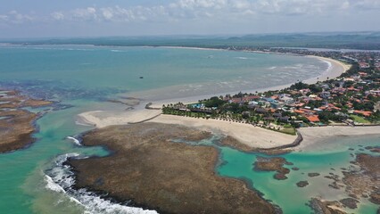 Fantastic panoramic view of Serrambi beach with coral reefs, natural swimming pools in the sea,...