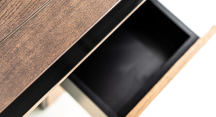 Opened drawer cabinet furniture wooden table at workplace