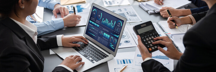 Business intelligence and data analysis concept. Analyst team working on financial data analysis...
