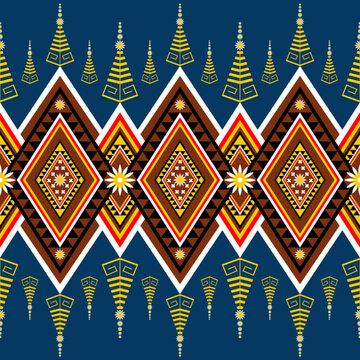 Colorful ethnic tribal pattern with geometric diamond shapes in blue, red, yellow, and brown. Traditional seamless design for fabric, textile, wallpaper, and decoration.