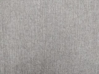 Rough gray and brown textured surface, natural and slightly weathered, detailed patterns for background or design, earthy and neutral tones.