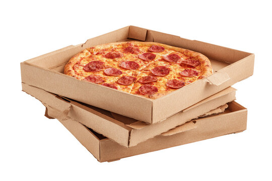 Pizza in a cardboard box.  Stacked boxes.  Appetizing