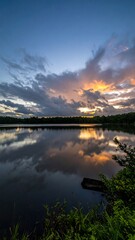Serene lake sunset reflection