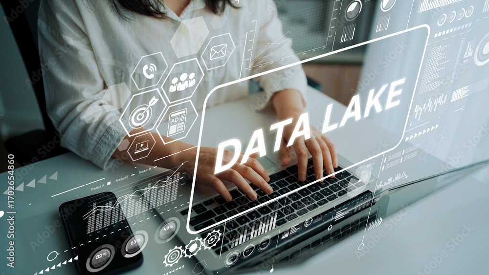 Poster professional working on a laptop with data lake concept showcasing analytics and technology in a mod