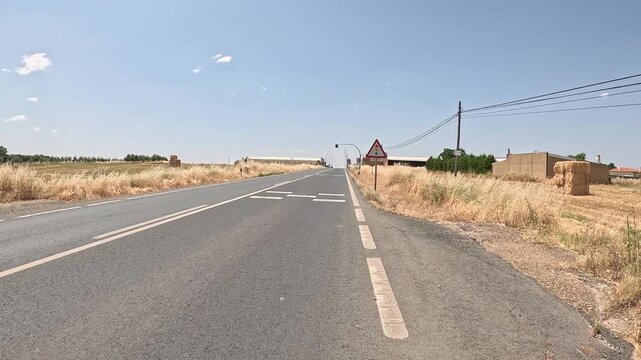 A-422 paved road entering Hinojosa del Duque, province of Cordoba, Andalusia, Spain