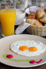variety of breakfast items, breads, eggs, waffles, cereals, and cheeses