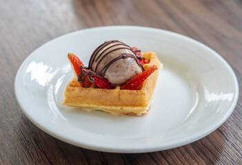 variety of breakfast items, breads, eggs, waffles, cereals, and cheeses