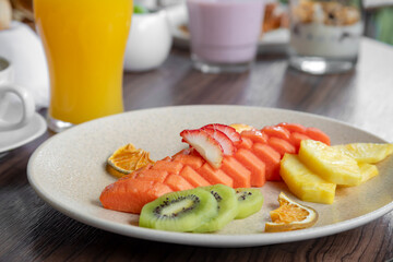 variety of breakfast items, breads, eggs, waffles, cereals, and cheeses