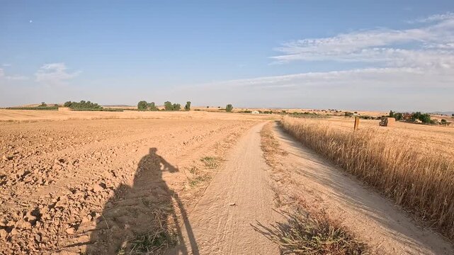 Camino Mozarabe de Santiago - dirt road on a summer landscape after Hinojosa del Duque, province of Cordoba, Andalusia, Spain