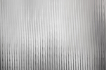 Obraz premium Subtle silver background with fine vertical lines creating a textured surface, perfect for elegant designs and minimalist presentations