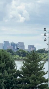 Captivating scene of a helicopter gliding above Washington DC, offering a unique city view.
