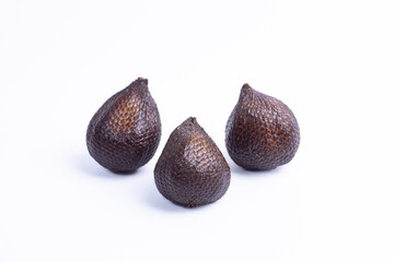 Three whole salak fruits isolated on white background, showcasing scaly brown skin and tropical pear shape. Perfect for organic, healthy, and exotic food themes.
