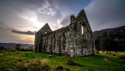 Fototapeta premium Ruined stone church at sunset