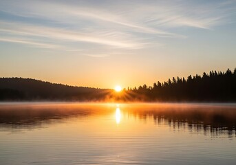 Fototapeta premium A serene sunrise paints the tranquil lake with golden hues, reflecting the sun's warm rays on the still water, creating a peaceful and breathtaking landscape.
