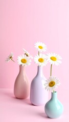 Pastel vases with daisies