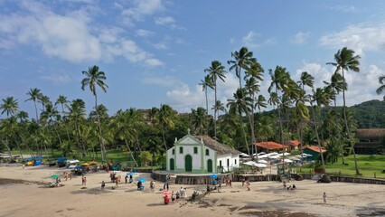 Wonderful aerial view of Praia dos Carneiros beach with stunning landscape with sand banks, palm...