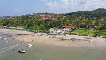 Wonderful aerial view of Praia dos Carneiros beach with stunning landscape with sand banks, palm...