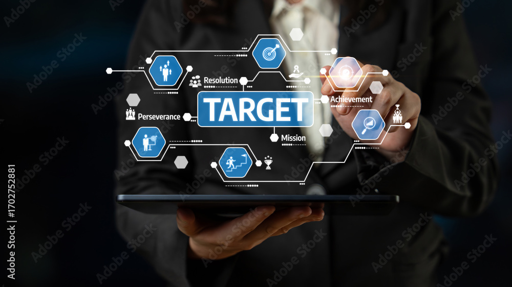 Aufkleber a businesswoman interacts with a digital interface displaying target achievement metrics and objecti