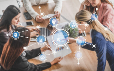 A diverse business team engages in a collaborative meeting while utilizing digital tools and data icons to enhance productivity and innovation in the workspace. Tessel