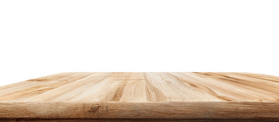 Light brown wooden table top against a black background