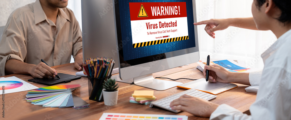 Poster virus warning alert on computer screen detected brisk cyber threat , hacker, computer virus and malw