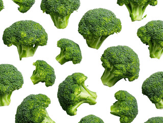 Fresh broccoli florets scattered on a black background