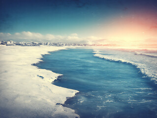 Obraz premium warm and vintage-style sun flare with a soft, golden hue and subtle artifacts