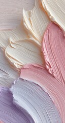 Close-up view of creamy pastel paint strokes in shades of pink, lavender, and beige, exhibiting texture and layering