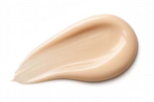 Beige foundation cream blending smoothly, revealing silky texture and natural skin-perfecting qualities against clean minimalist backdrop