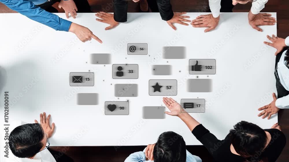 Poster a diverse team collaborates around a table, discussing strategies and data visualizations for social