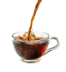 Dark liquid pours into a clear glass teacup