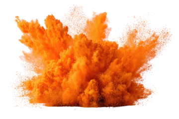 Explosive orange powder explosion against black background