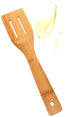 Wooden spatula and sliced onion